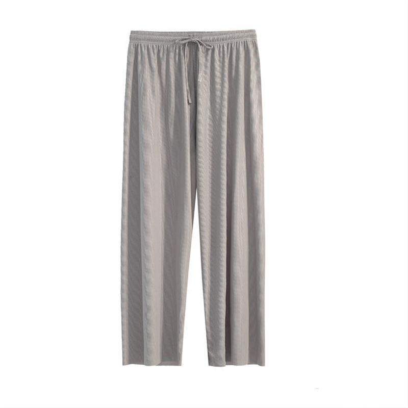 Pantalon large en soie glacée.
